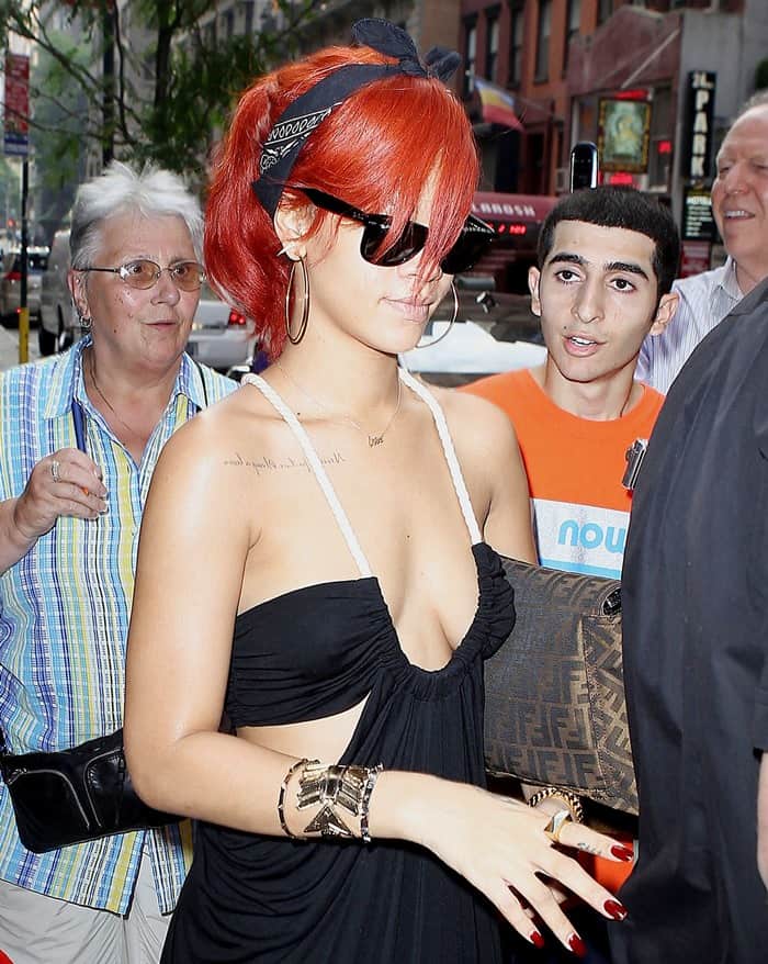 Rihanna wearing a House of Harlow bracelet while leaving her hotel in New York City on July 21, 2011