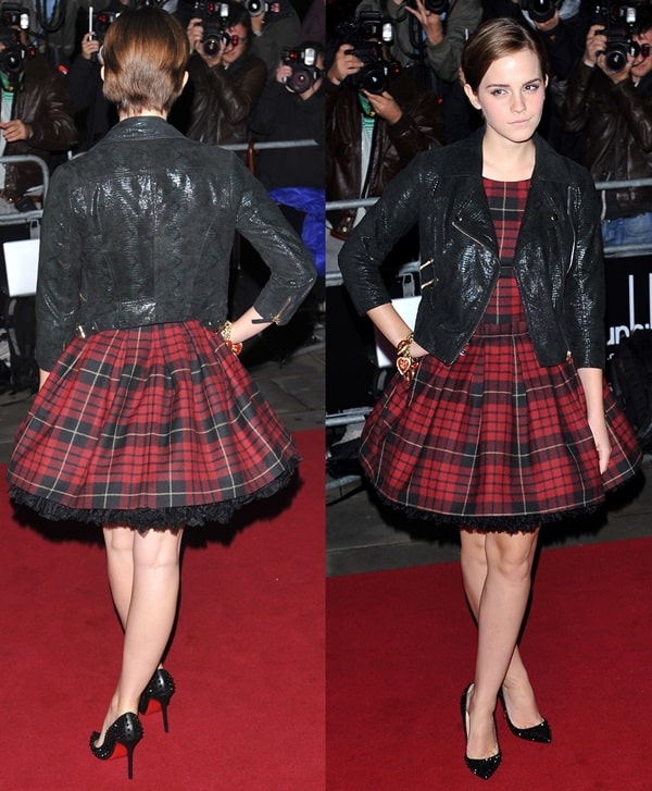 Emma Watson made a striking appearance at the GQ Men Of The Year Awards  in a tartan plaid minidress by McQ, the diffusion line of Alexander McQueen, paired with a glossy black moto jacket
