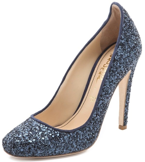 A twinkling crush of glitter catches the light on this pair of playful pumps, while a raised counter and softly squared toe sculpt the silhouette