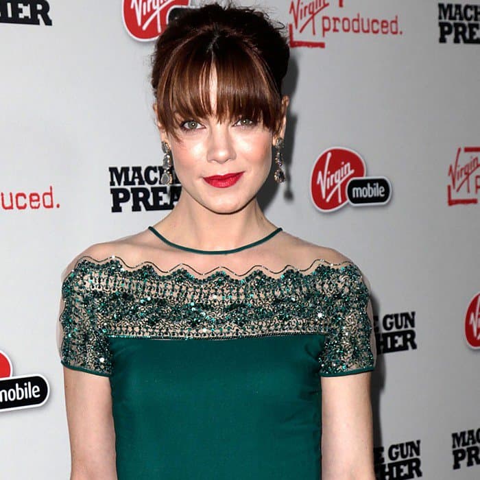 Captured at the 'Machine Gun Preacher' premiere, Michelle Monaghan stuns in a Valentino ensemble, exuding Hollywood glamour