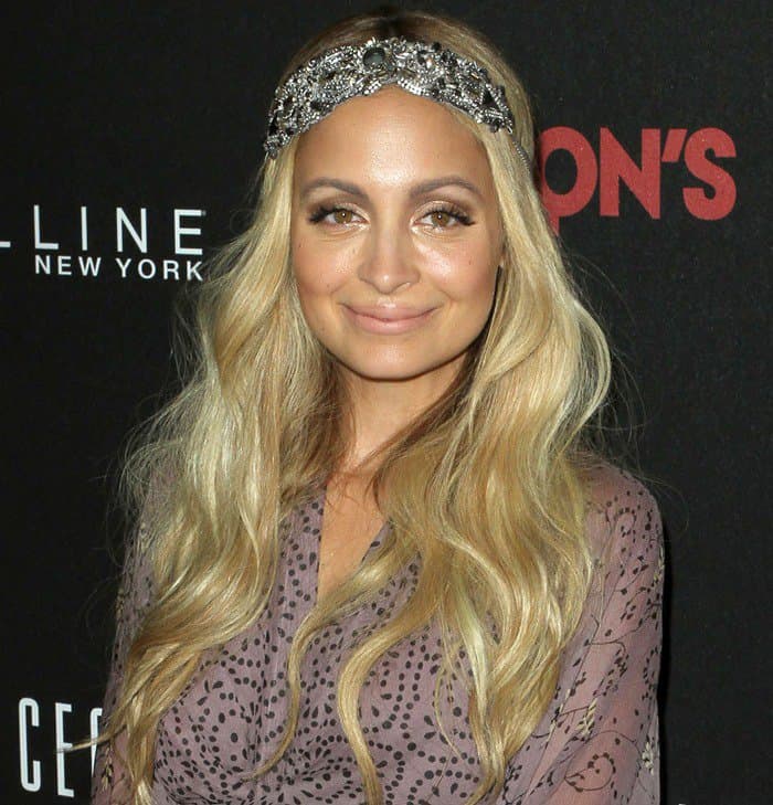Nicole Richie captivates at Fashion's Night Out with her striking hazel eyes, complementing the evening's allure