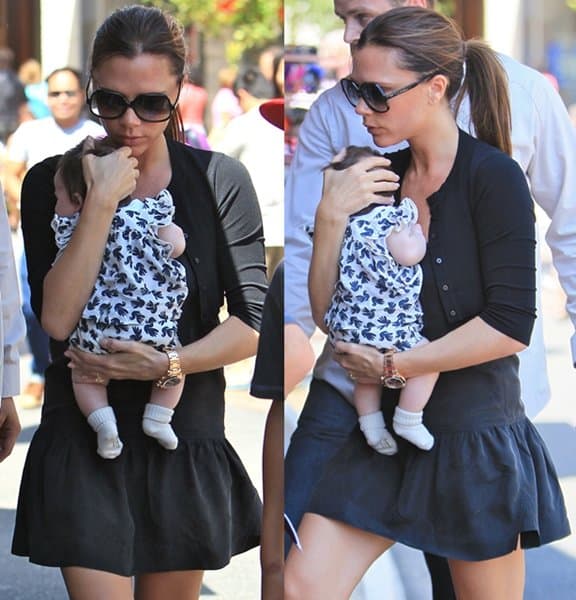 Victoria Beckham exhibits a softer, more casual style while carrying daughter Harper during a shopping trip at The Grove, Los Angeles, on September 4, 2011