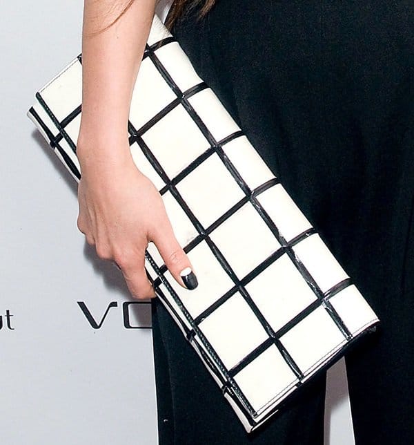 Style icon: China Chow makes a bold statement with her checkered black and white oversized clutch