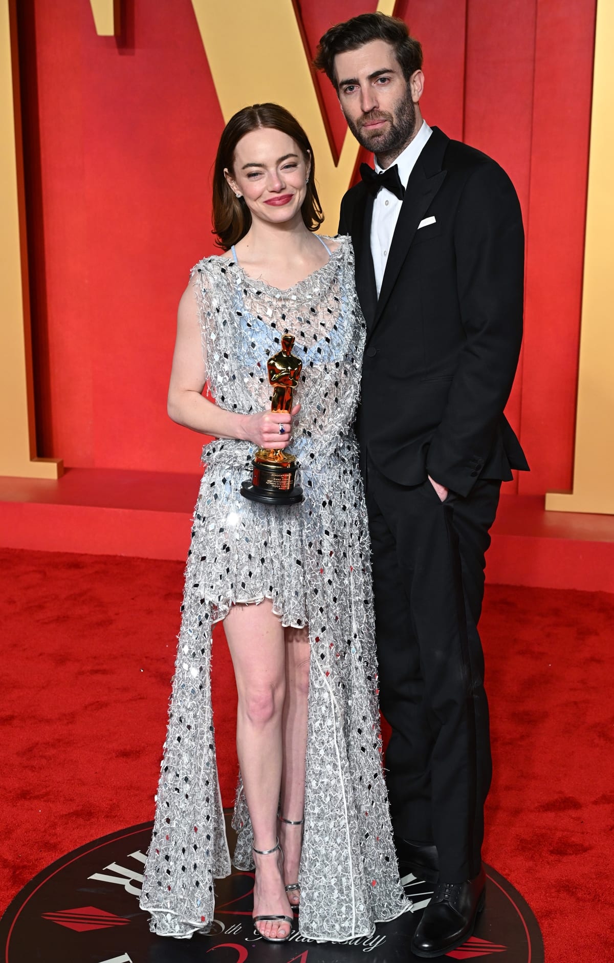 At the 2024 Vanity Fair Oscar Party, Emma Stone, with her height of 5 feet 6 inches (167.6 cm), was notably shorter than her husband, Dave McCary, who stands tall at 6 feet 2 inches (1.88 m)