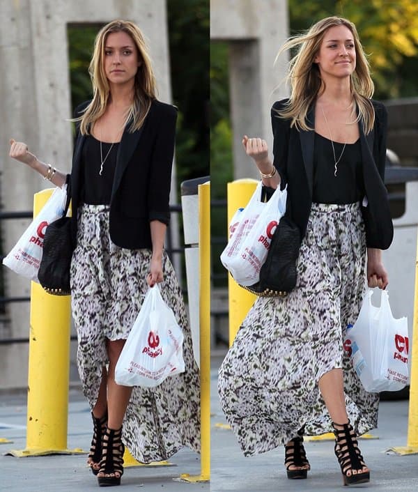 Kristin Cavallari kept it simple but chic by wearing an asymmetrical skirt that she then topped with a blazer and capped off with ankle high gladiator heels