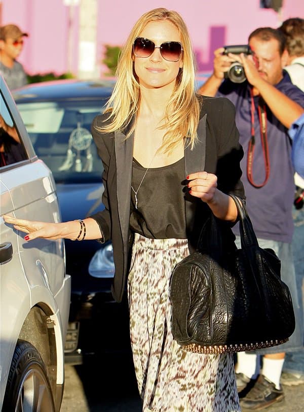 Kristin Cavallari stopped and smiled for the cameras in in West Hollywood on October 12, 2011