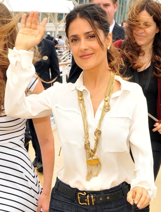 Salma Hayek exuded elegance at the 'Puss in Boots' premiere in a chic Stella McCartney off-white silk blouse