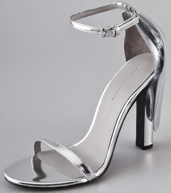 These mirrored-leather sandals feature a buckled strap at the ankle and a detachable flap overlay at the heel cap