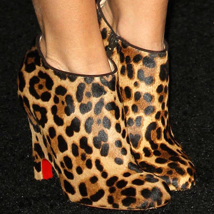 Ashley Tisdale wearing Christian Louboutin 'Morphing' leopard-print booties