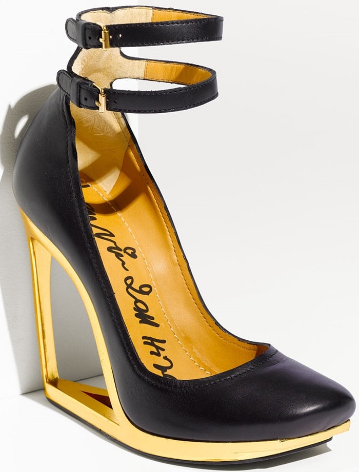 A gleaming, cutout heel lifts a statement-making leather pump topped with two adjustable ankle straps