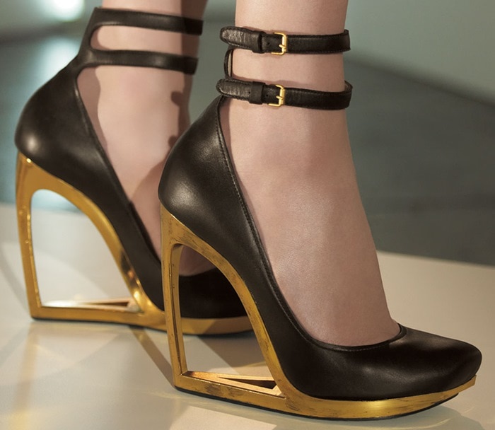 A gleaming, cutout heel lifts a statement-making leather pump topped with two adjustable ankle straps