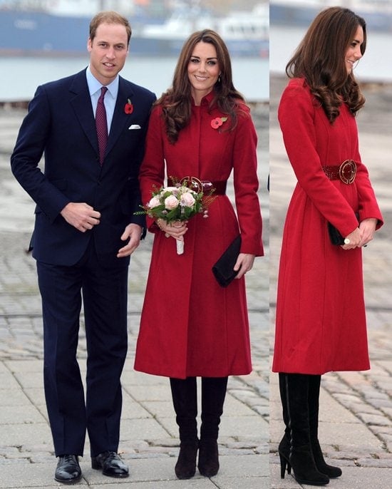 Kate Middleton styled her look with a burgundy L.K. Bennett Ami coat cinched by a Reiss Bessie belt, Stuart Weitzman Zipkin knee-high suede boots, a black suede Muse clutch by Stuart Weitzman for Russell & Bromley, Vinnie Day gold-plated logo leaf earrings, and her iconic Garrard & Co 12k Ceylon sapphire and diamond engagement ring