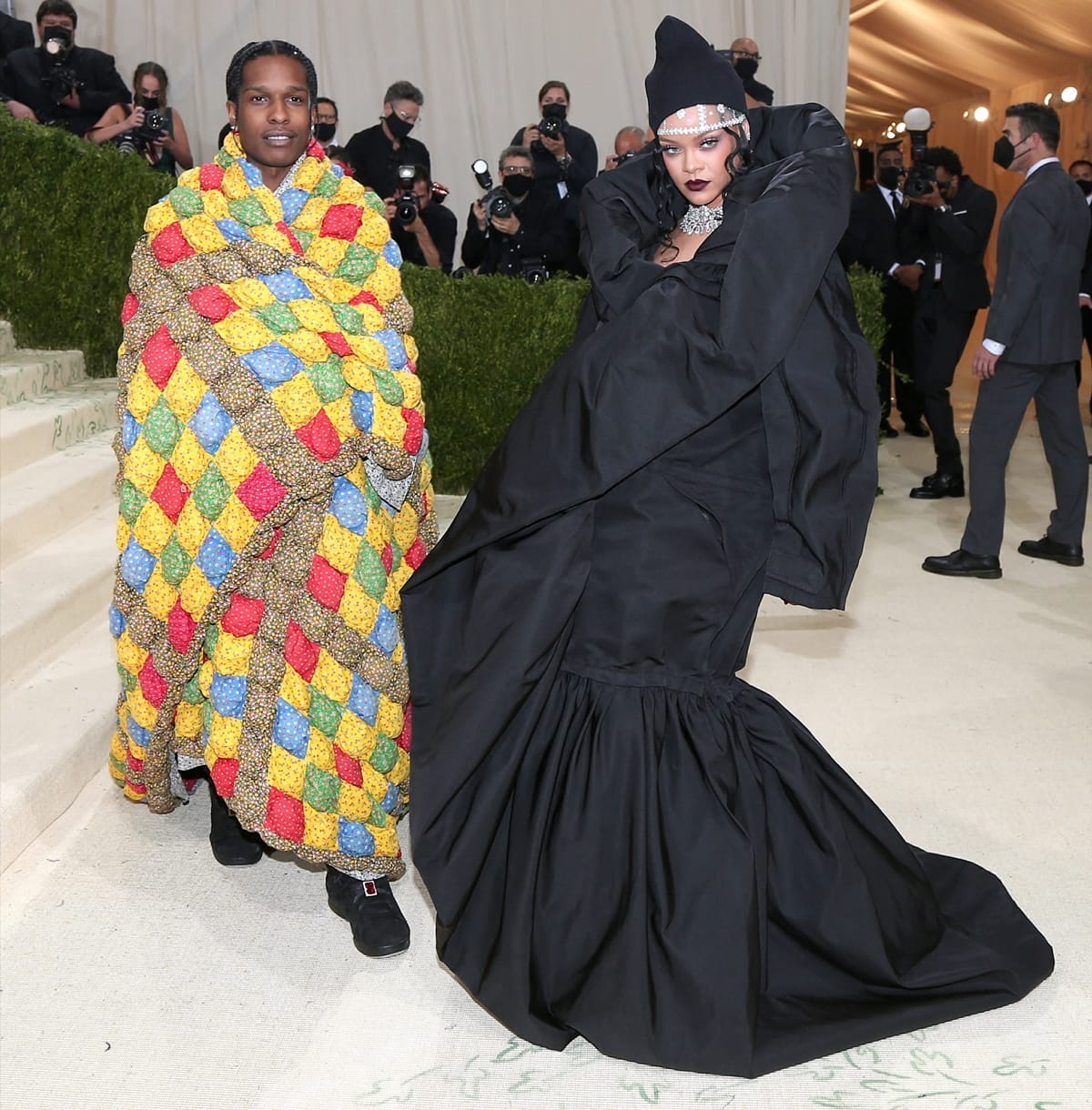 Rihanna in a black Balenciaga couture gown with her boyfriend, A$AP Rocky, at the 2021 Met Gala