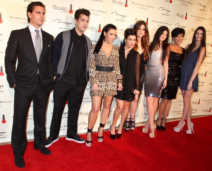 Scott Disick, Rob Kardashian, Kim Kardashian, Kourtney Kardashian, Khloé Kardashian Odom, Kylie Jenner, Kris Jenner, and Kendall Jenner at the grand opening of their Kardashian Khaos store