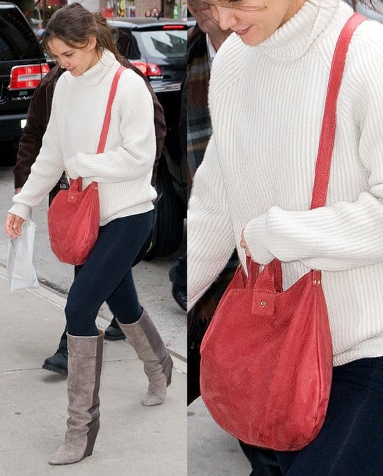 On December 17, 2011, Katie Holmes was seen leaving her NYC hotel wearing Oliver Peoples Shean keyhole Wayfarer sunglasses, a Clare Vivier messenger bag, and Nine West Daley wedge boots