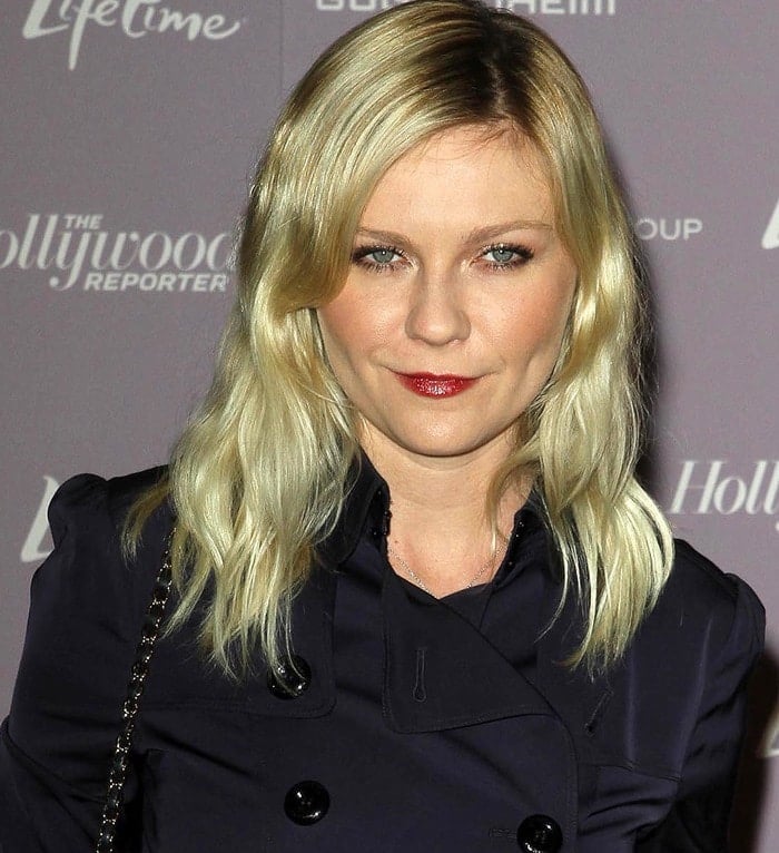 Kirsten Dunst rocks a navy Burberry trench-coat dress at The Hollywood Reporter's Annual "Power 100: Women In Entertainment Breakfast"