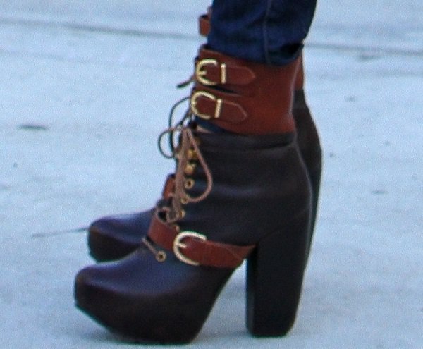 Vanessa Hudgens completes her look with a pair of brown Miista 'Andee' platform buckle boots