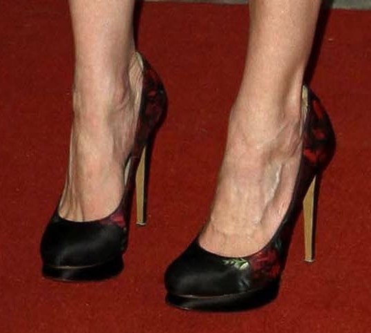 Kirsten Dunst's feet in Nicholas Kirkwood floral print satin pumps