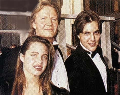 Pictured with her brother James Haven and her father Jon Voight, Angelina Jolie was bullied in high school and reportedly suffered from the common eating disorder anorexia