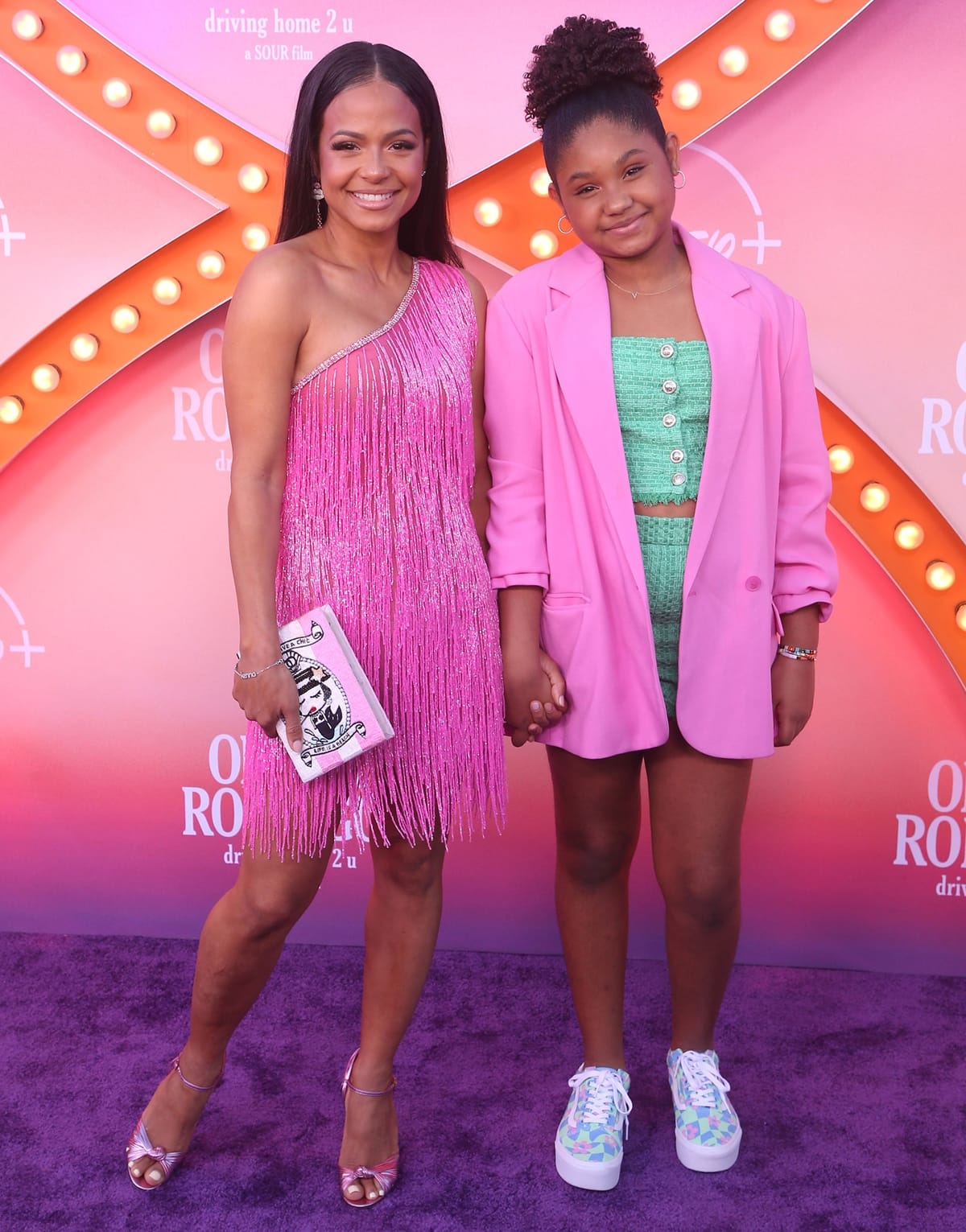 Christina Milian and Violet Nash attend the premiere of "Olivia Rodrigo: Driving Home 2 U (A Sour Film)"