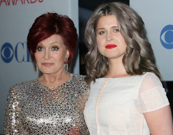 Sharon Osbourne and Kelly Osbourne pose for photos at the People's Choice Awards