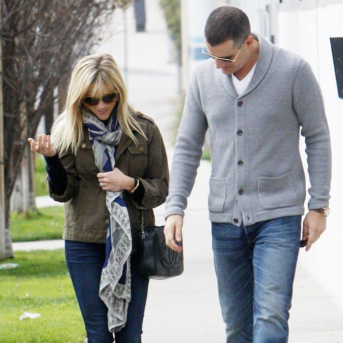 Reese Witherspoon wearing a Theodora & Callum scarf while leaving a church in Los Angeles with Jim Toth