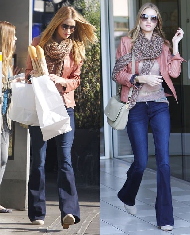 Rosie Huntington-Whiteley wears a cozy Isabel Marant mohair blend sweater with a sleek IRO Ashville washed leather biker jacket and a pair of classic Rag & Bone Classic Newbury booties