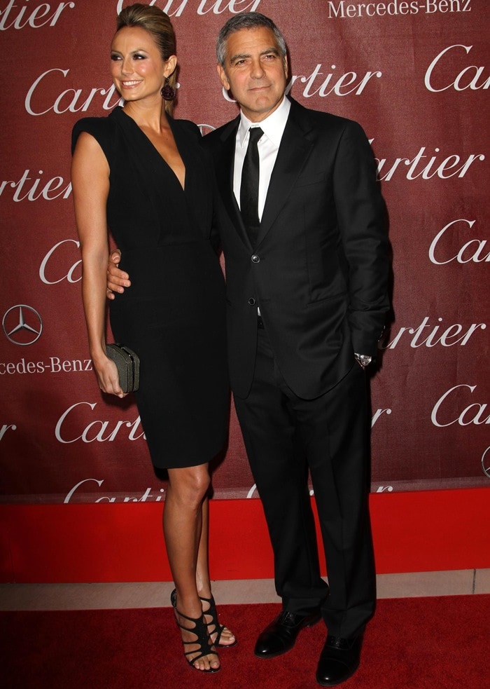 Stacy Keibler flaunted her sexy legs in a black deep V-front Alexander McQueen dress