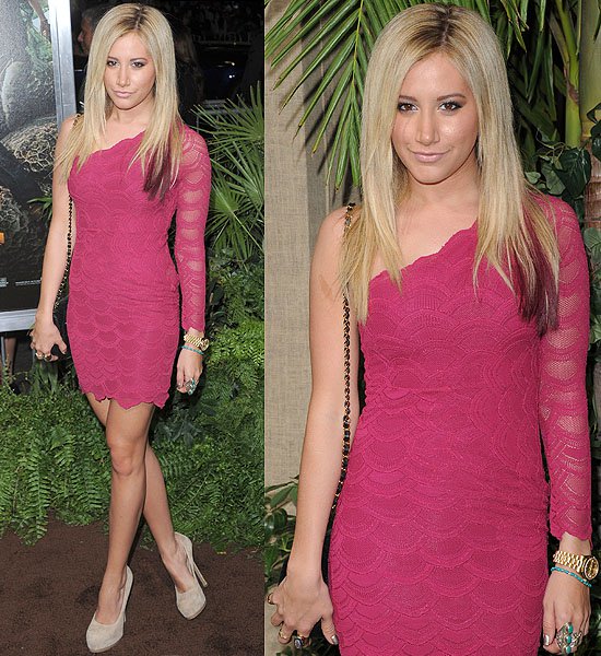 At the Los Angeles premiere of "Journey 2: The Mysterious Island" on February 2, 2012, Ashley Tisdale elegantly paired a Nightcap one-sleeve dress with Yves Saint Laurent Tribtoo pumps, accessorized with a Soixante Neuf turquoise tri-stone shield ring, a Low Luv x Erin Wasson gold moonstone ring, a Rolex Day Date Presidential watch, and a classic Chanel mini flap bag