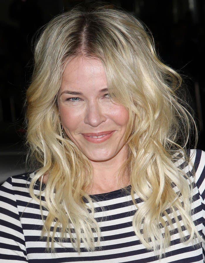 Chelsea Handler radiates effortless elegance at the 'This Means War' premiere in a casual yet chic striped dress, demonstrating her unique style at Grauman’s Chinese Theatre, Hollywood