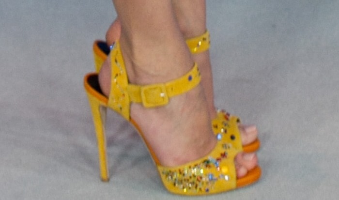 Diane Kruger showed off her feet in bejeweled yellow sandals