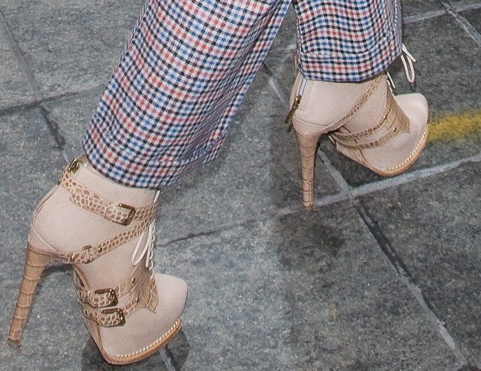 Jennifer Lopez wears buckled Dior Guetre leather platform booties