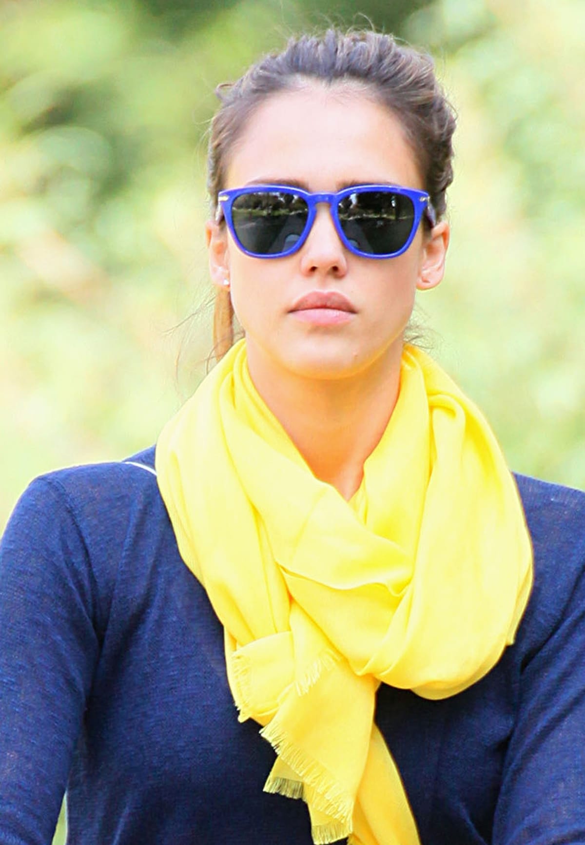 Jessica Alba wraps up her Beverly Hills outing in vibrant style, with her bright yellow Love Quotes scarf perfectly accentuating her navy color block ensemble