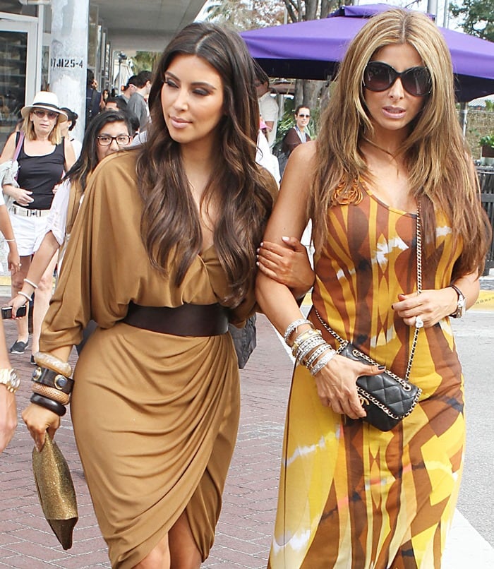 Joined by her then-BFF Larsa Pippen, Kim Kardashian sported a simple tan dress and toted a matching clutch