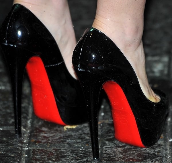 Lily Collins rocking black patent Christian Louboutin pumps