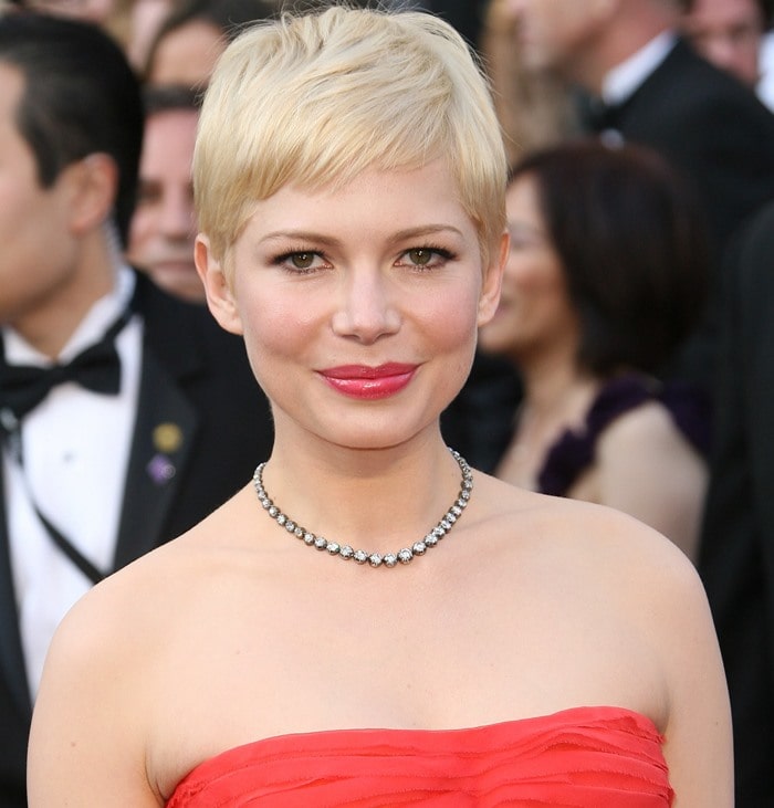 Michelle Williams completed her look with a bright red lip and Forevermark jewels at the 84th Annual Academy Awards (Oscars) held at the Kodak Theatre in Los Angeles
