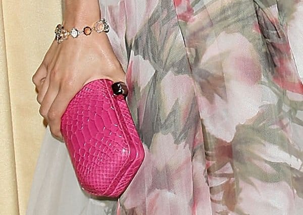 Nina Dobrev at the Forevermark & InStyle Beauty & Brilliance Celebration, gracefully holding her Rebecca Minkoff 'Fling' clutch