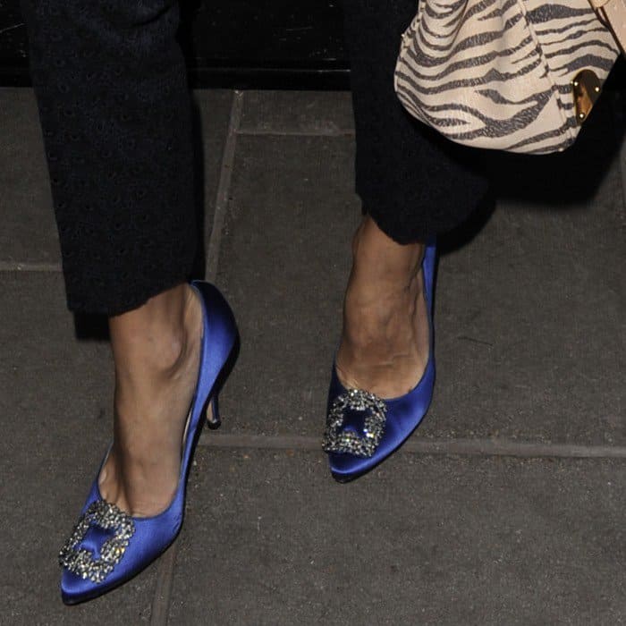 Olivia Palermo stuns in cobalt blue satin Manolo Blahnik pumps featuring signature crystal-embellished buckles for an effortlessly elegant touch