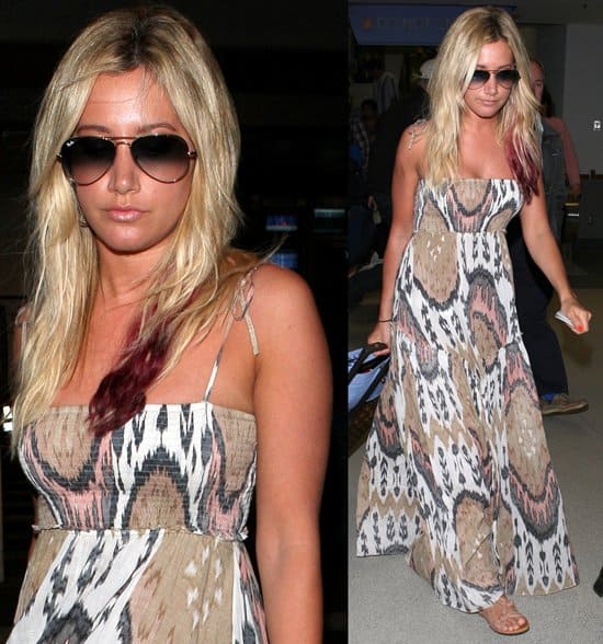 Ashley Tisdale exuded casual chic at LAX on March 23, 2012, accessorizing her AllSaints Ikat Maxi Dress with a Balenciaga Giant City bag in light blue, BC Footwear's 'Sleep Under the Stars' sandals and Ray-Ban 3025 Aviator sunglasses