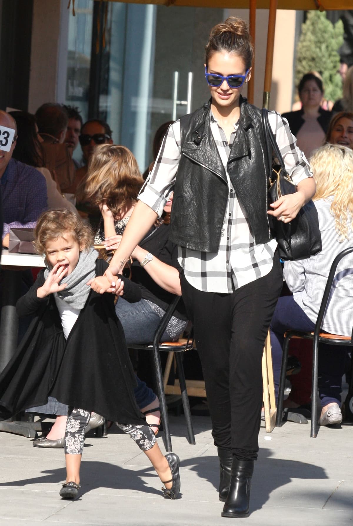 On February 24, 2012, Jessica Alba was spotted in Los Angeles sporting a Madewell silk gatehouse shirt and accessorizing with a Chloe Angie large bag