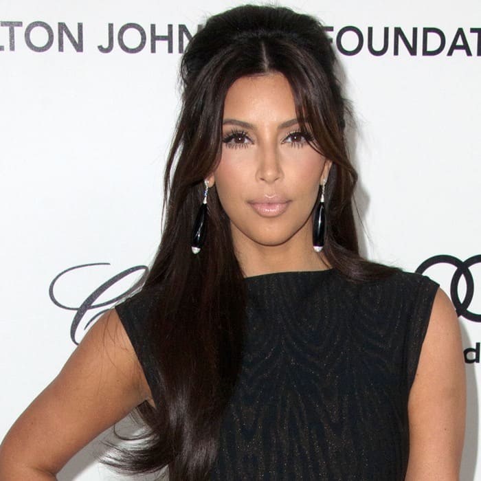 Kim Kardashian stuns in an elegant Alaia gown, a stylish choice for the Elton John AIDS Foundation Oscar Viewing Party