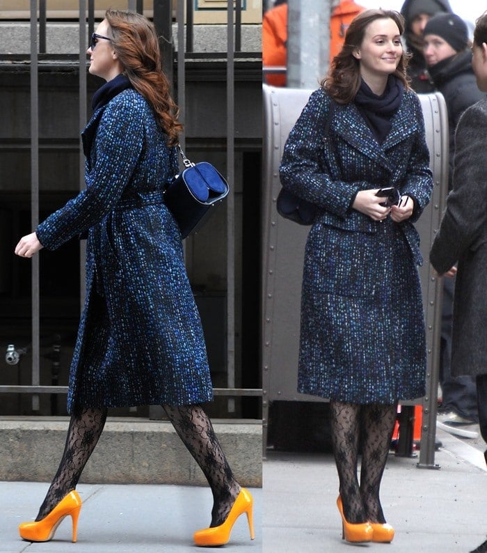 Leighton Meester adds a bold pop of color to her chic winter look with vibrant orange Brian Atwood 'Maniac' pumps, proving that statement heels can elevate any outfit