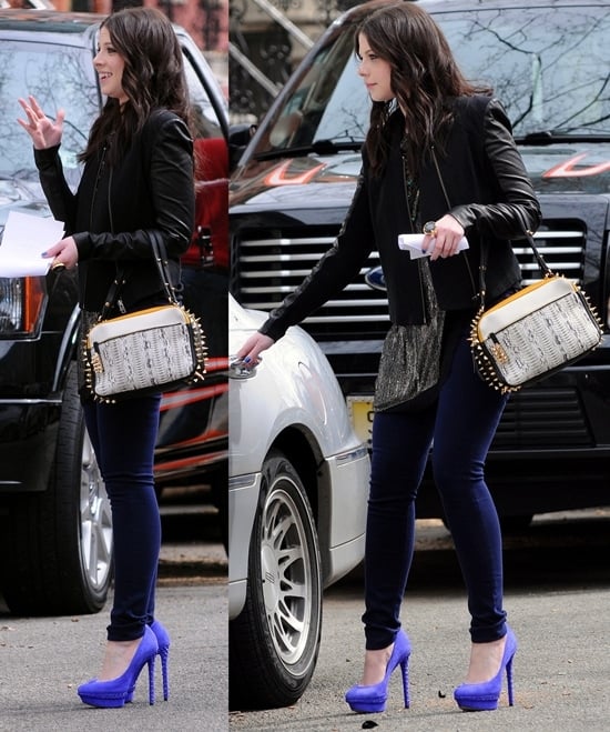 Michelle Trachtenberg switched to a pair of striking purple suede pumps to film a scene for "Gossip Girl" in New York City