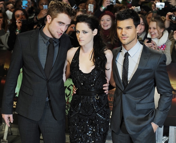 Robert Pattinson, Kristen Stewart and Taylor Lautner attend the UK premiere of The Twilight Saga: Breaking Dawn Part 1 at Westfield Stratford City on November 16, 2011 in London, England