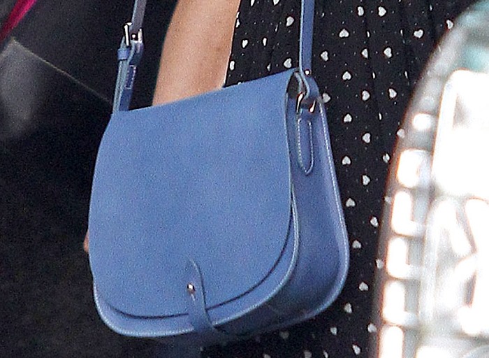 Taylor Swift totes a blue Ralph Lauren Collection saddle bag