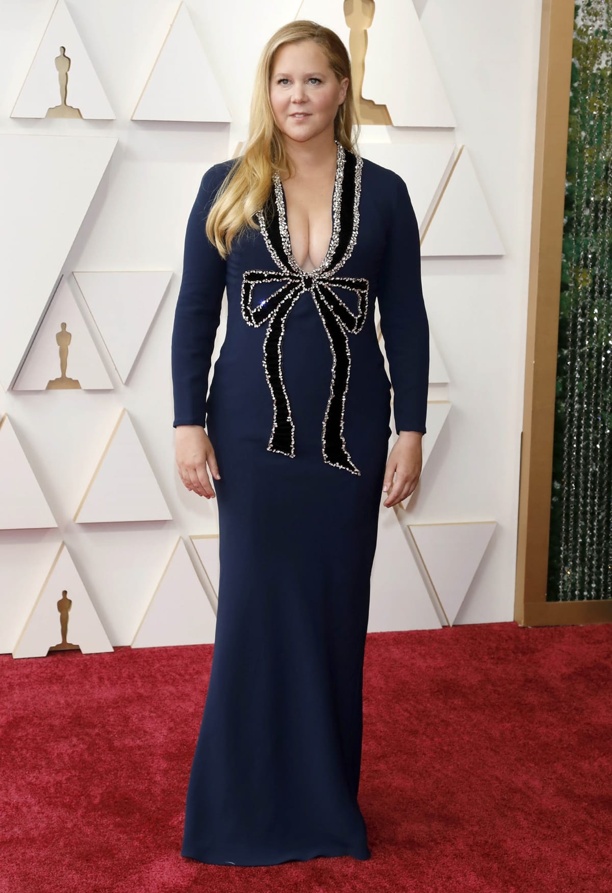 Amy Schumer in a bow-embellished Oscar de la Renta dress at the 94th Annual Academy Awards