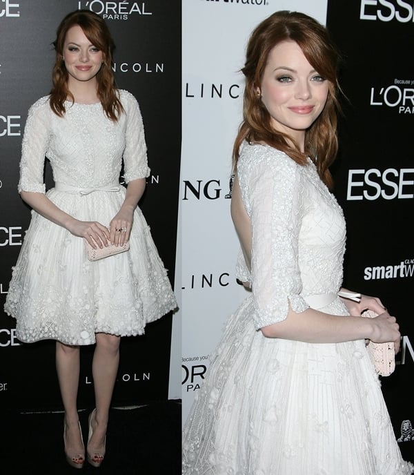 Emma Stone in a winter-white three quarter sleeve cocktail dress from Elie Saab