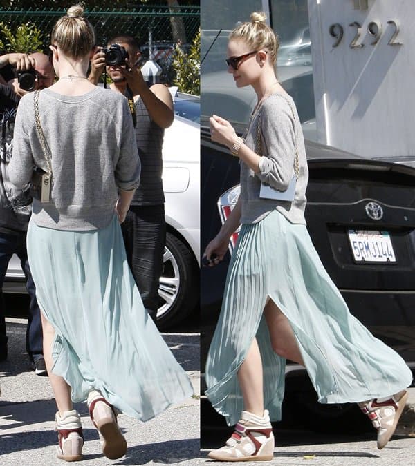 Kate Bosworth donned a beautiful minty sea-foam pleated maxi skirt with a soft raglan sweatshirt in a neutral grey tone