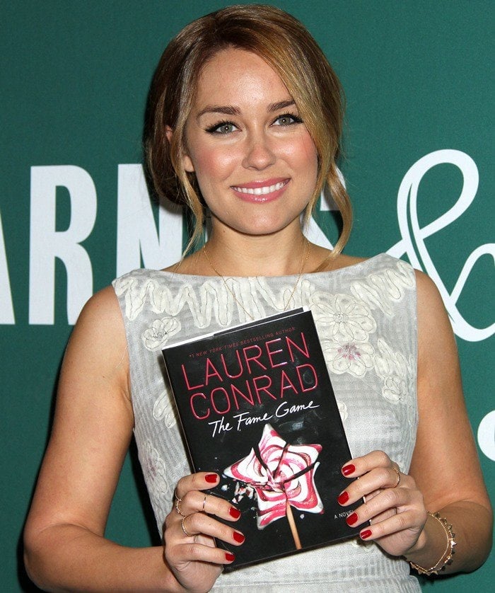 Lauren Conrad wears her hair back for a signing of her new book, "The Fame Game"