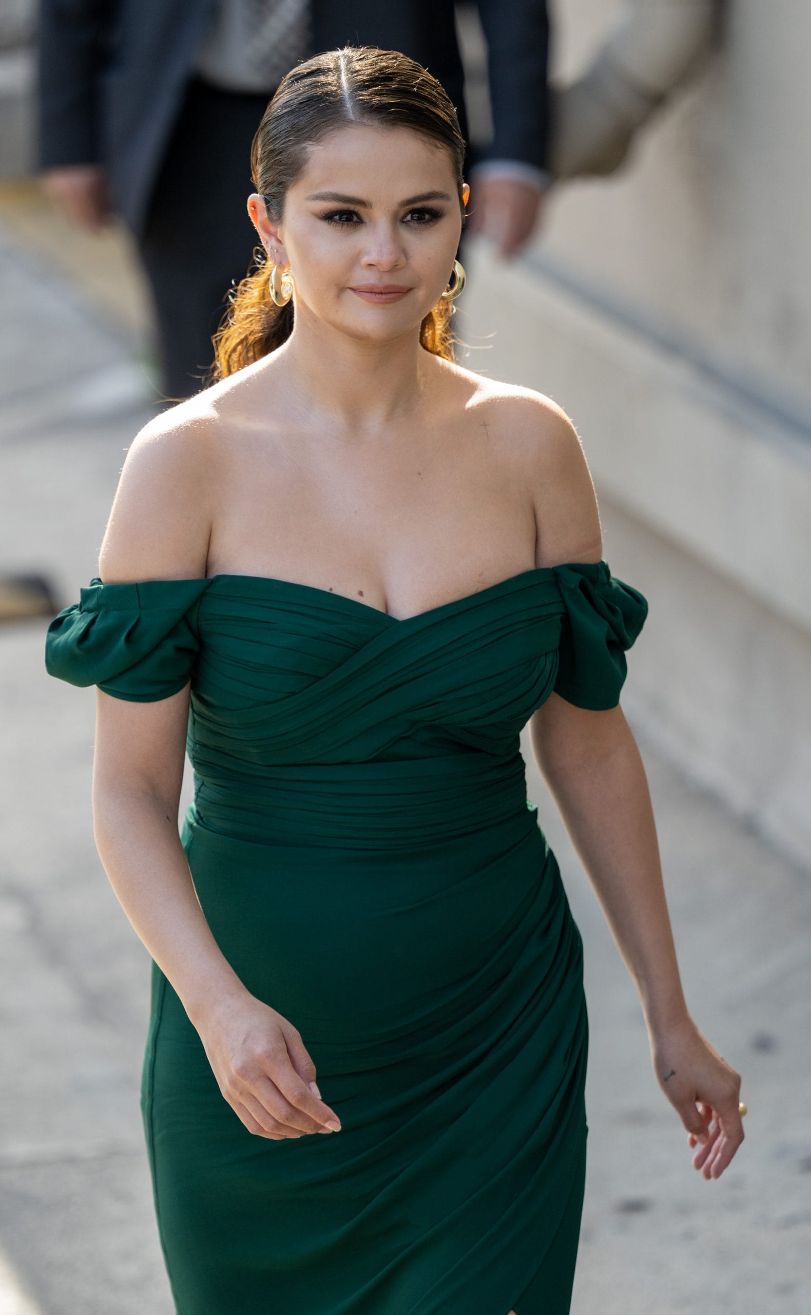 Selena Gomez wears a green Self-Portrait puff-sleeved gathered dress